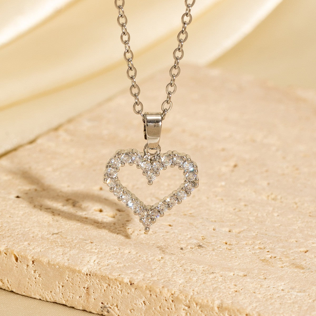 Malika Gems Minimal Luxe Heart Necklace – Elegant Hollow Design