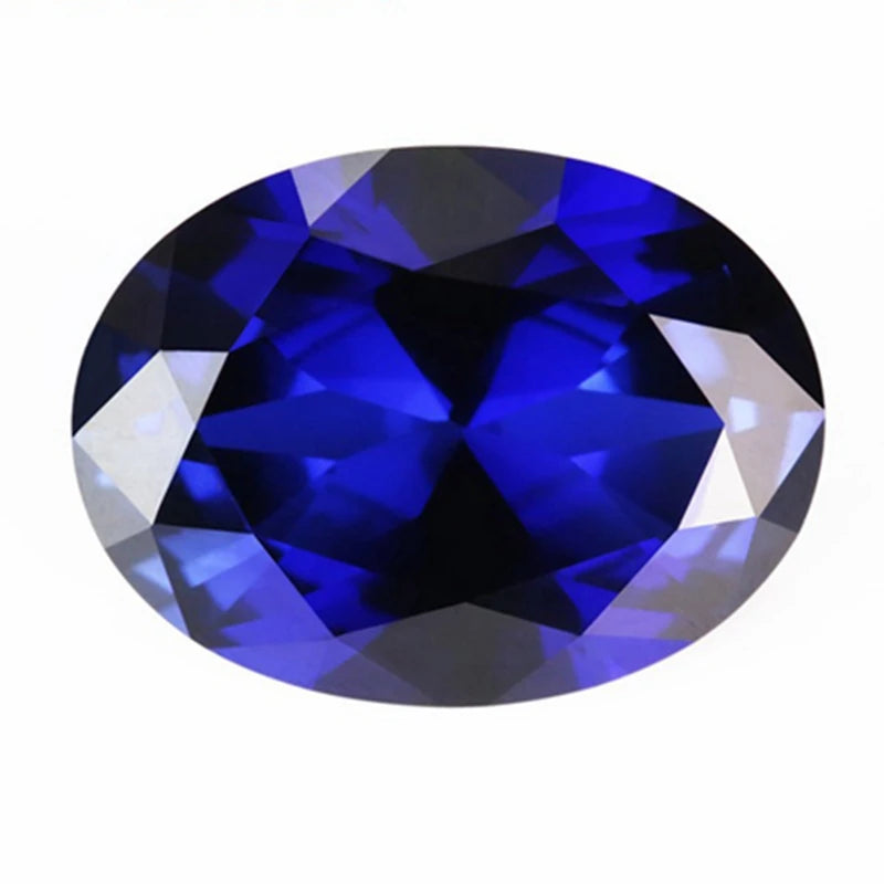 An oval-cut, faceted gemstone in a deep royal blue color, isolated on a solid white background.