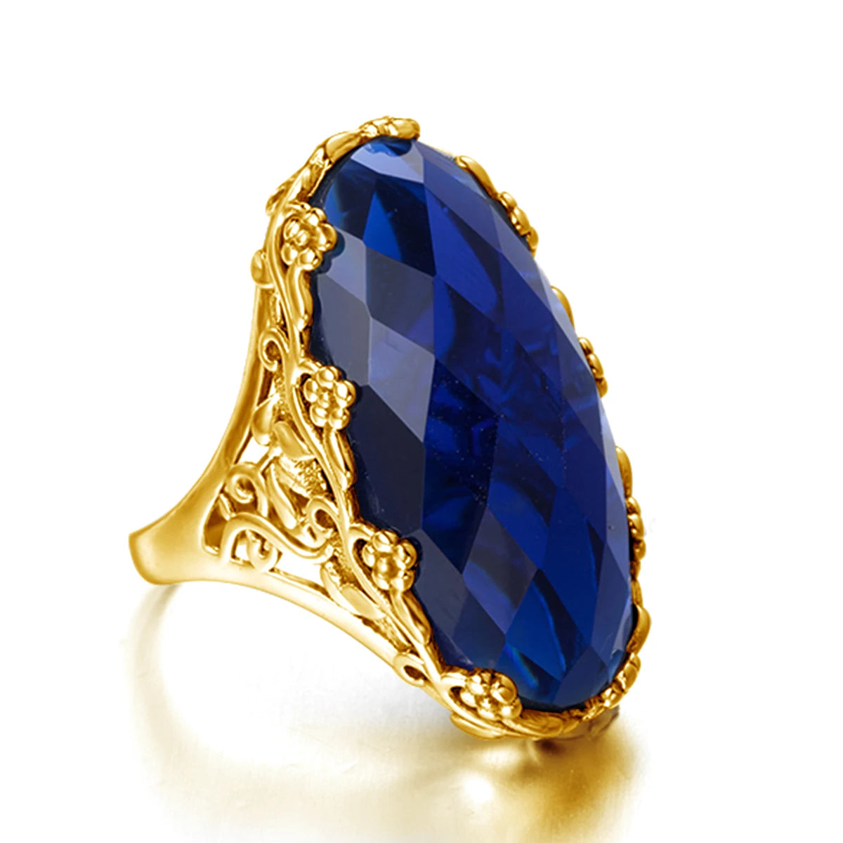 Gold ring with a large blue gemstone on a white background