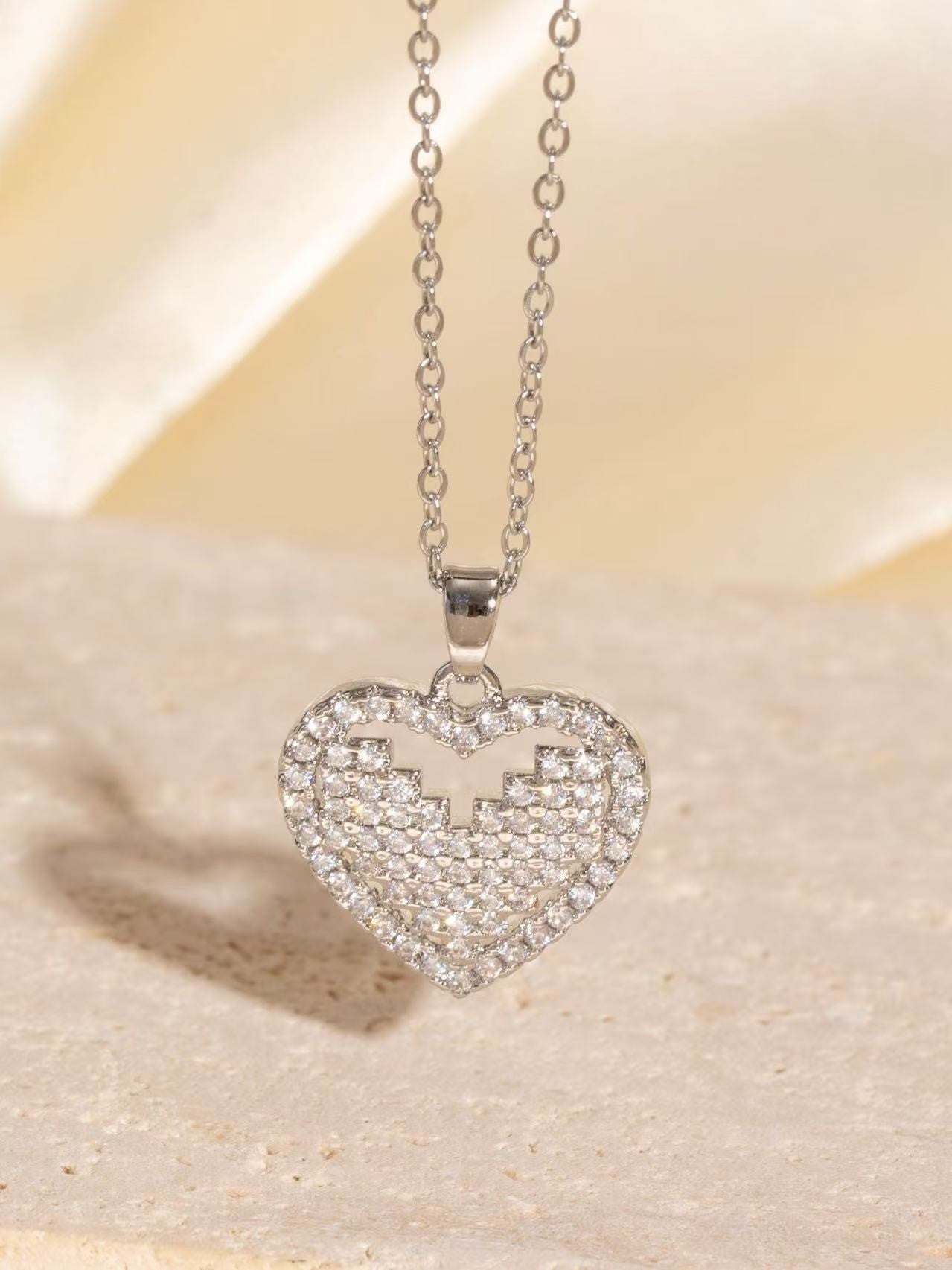 Malika Gems Minimal Luxe Heart Necklace – Elegant Hollow Design
